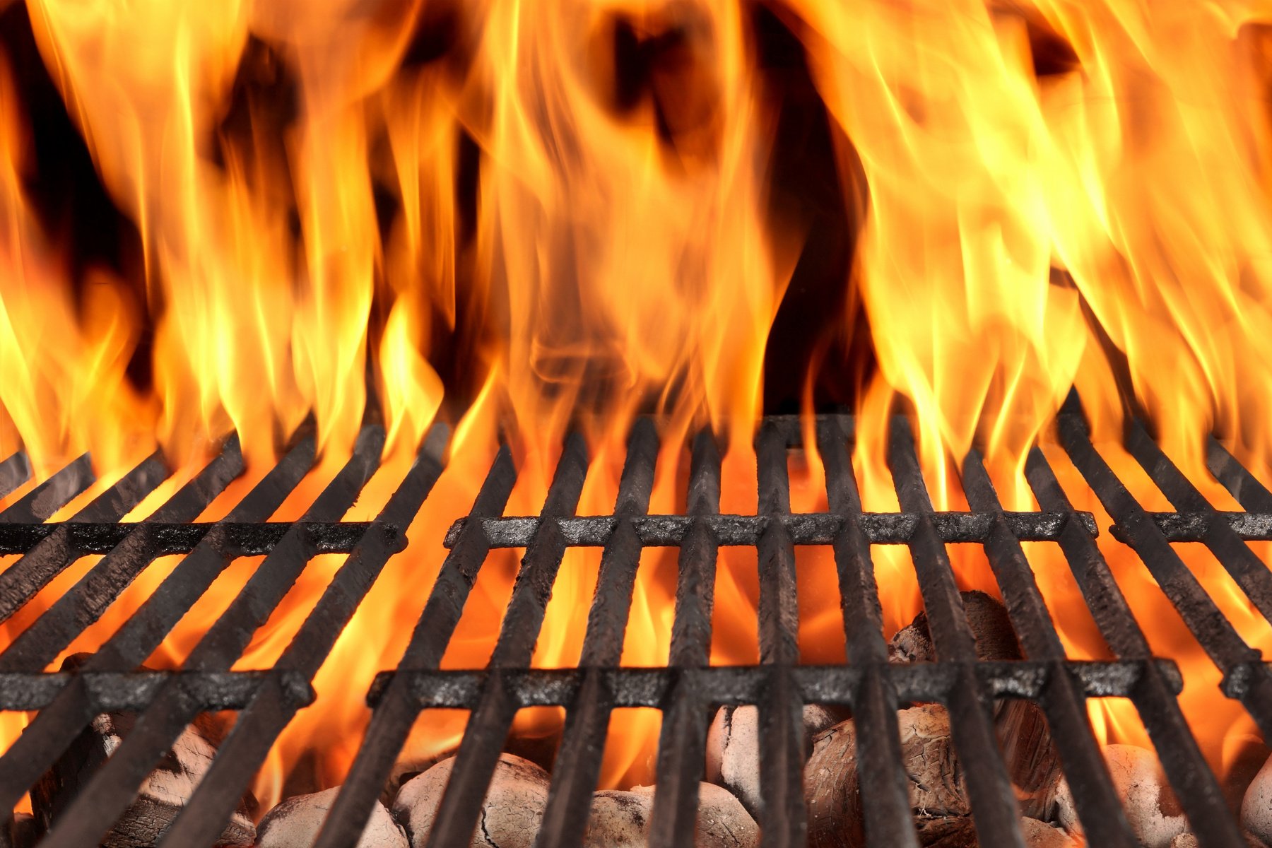 Empty BBQ Fire Grill And Burning Charcoal With Bright Flames.